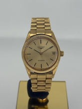 Carica l&#39;immagine nel visualizzatore di Gallery, Longines automatico con datario in oro giallo 18 KT 33mm
